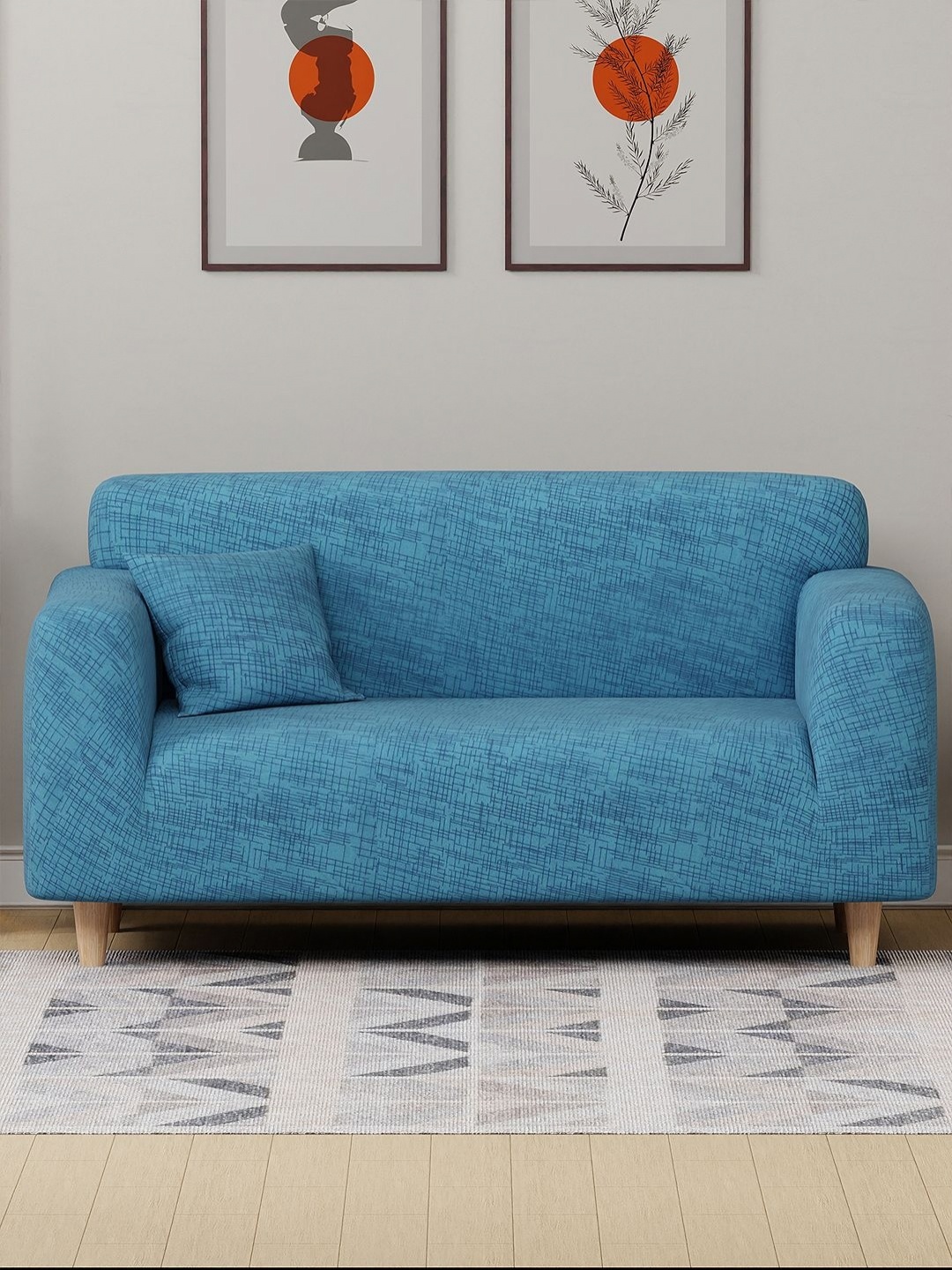 

Myntra Elegant Homes Blue 2 Piece Self Design Sofa Cover With Arms