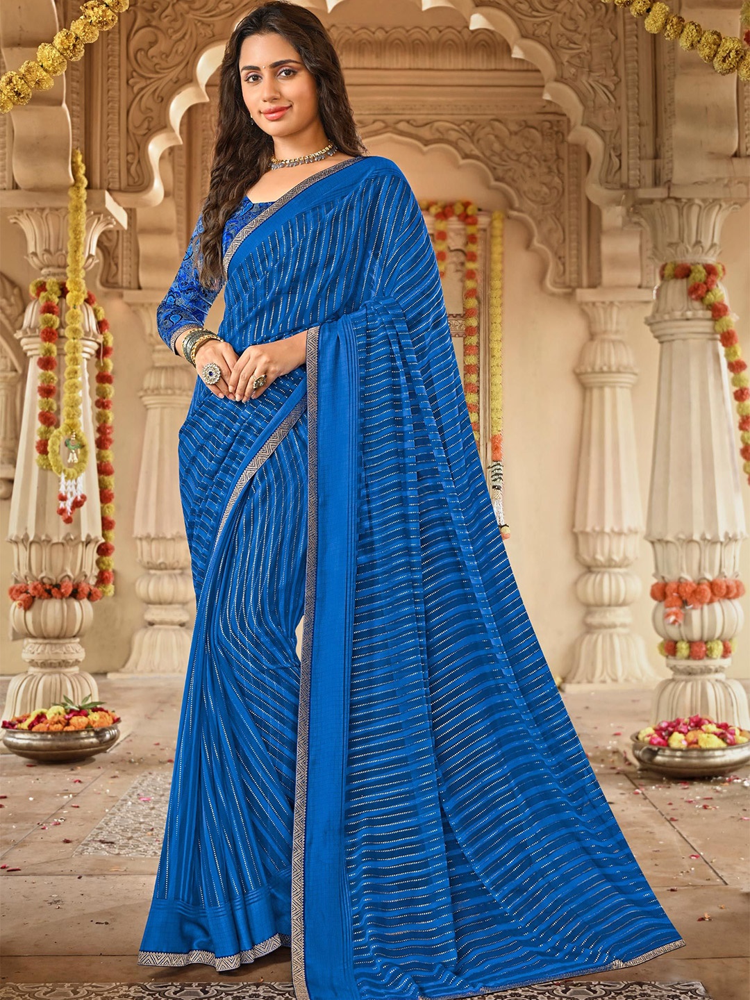 

Laxmipati Striped Sequinned Poly Georgette Designer Saree, Blue