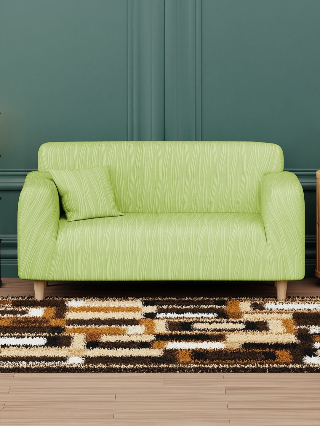 

Myntra Elegant Homes Green Wavy Stripes Pattern Two Seater Sofa Cover With Cushion Cover