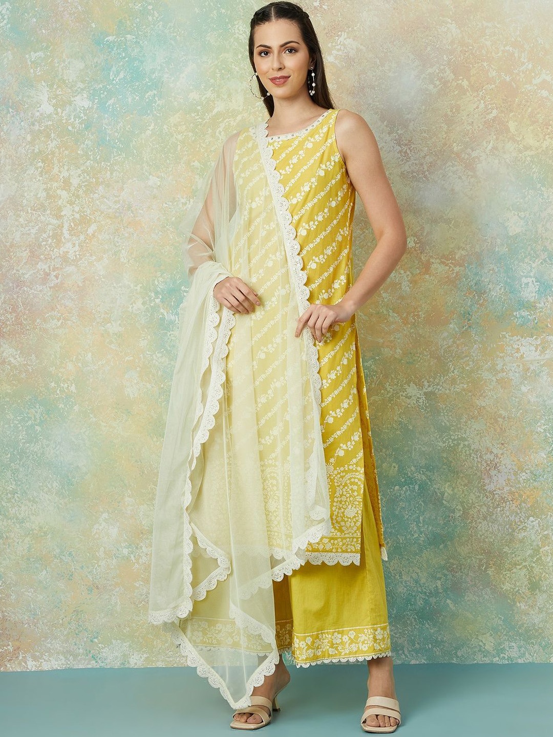 

Melange by Lifestyle Women Floral Printed Regular Pure Cotton Kurta with Trousers & With Dupatta, Yellow