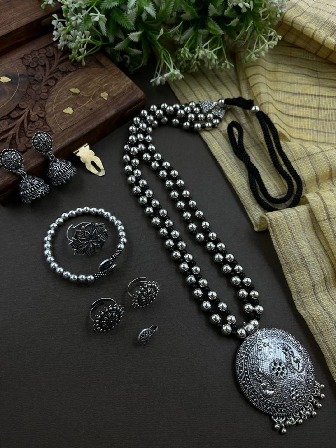 

NAMAN ARTS Kusha 2 Line Silver-Plated Oxidised Necklace Jewellery Set