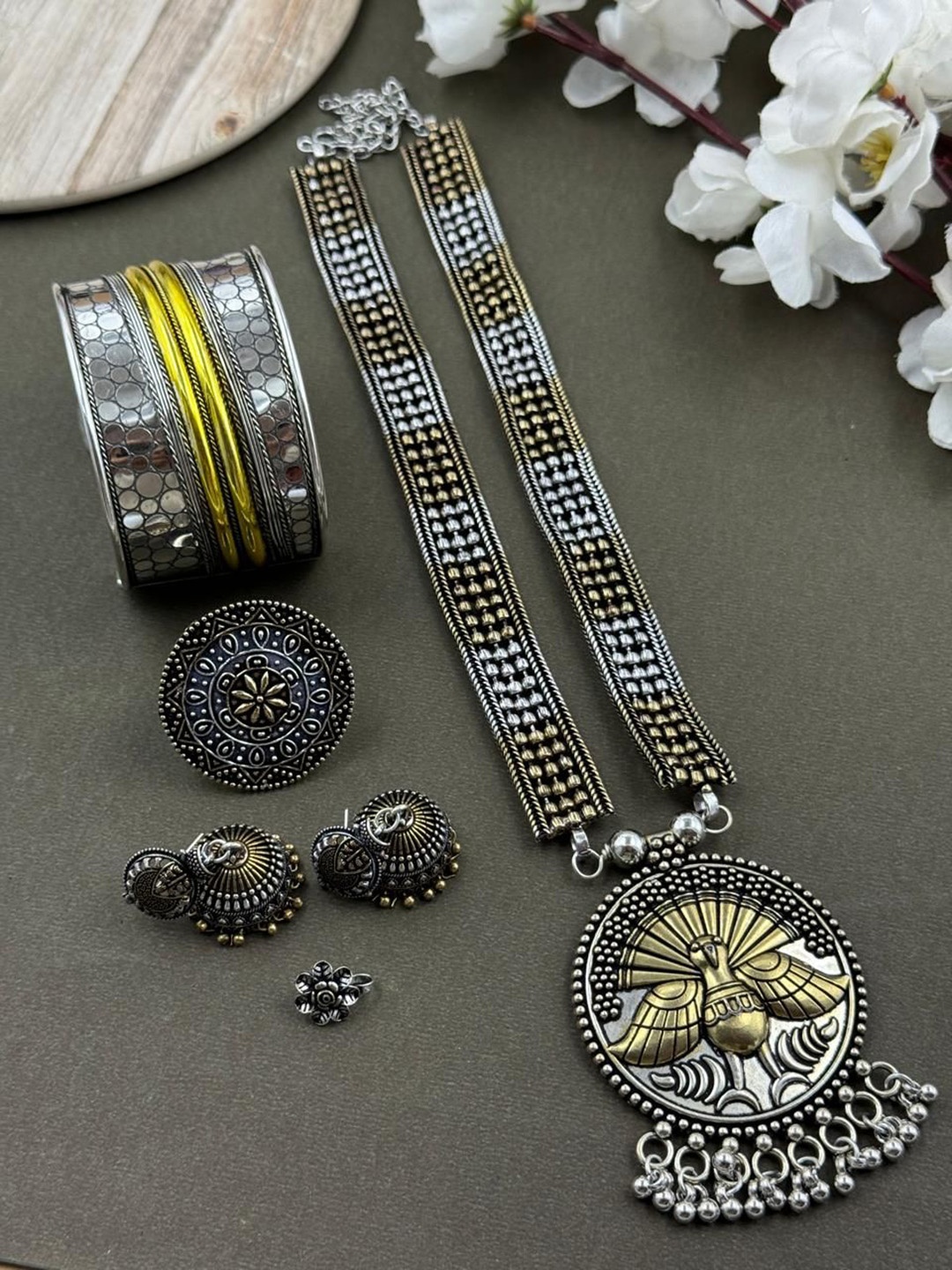 

NAMAN ARTS Gold Plated Oxidised Kia Dualtone Jewellery Set