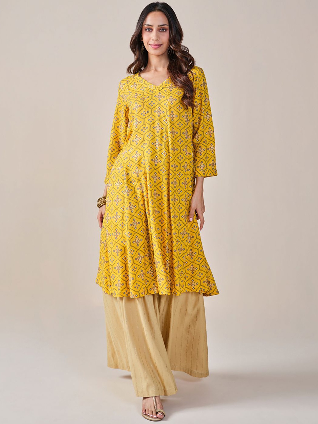 

Global Desi Women Geometric Dyed Flared Sleeves Thread Work Kurta, Mustard