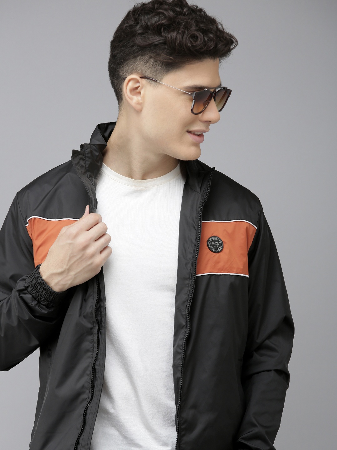 

U.S. Polo Assn. Men Black & Rust Colourblocked Lightweight Bomber Jacket