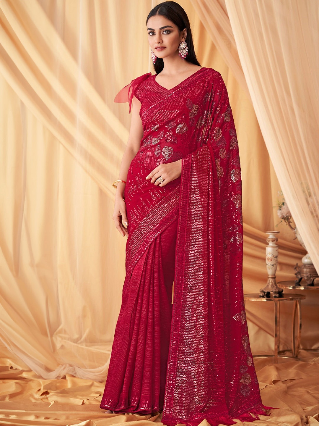 

Reboot Fashions Embellished Pure Georgette Saree, Magenta