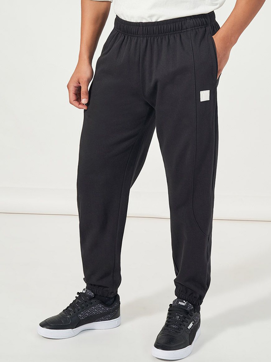 

Styli Men Relaxed Fit Jogger with Seam and Badge Detail, Black