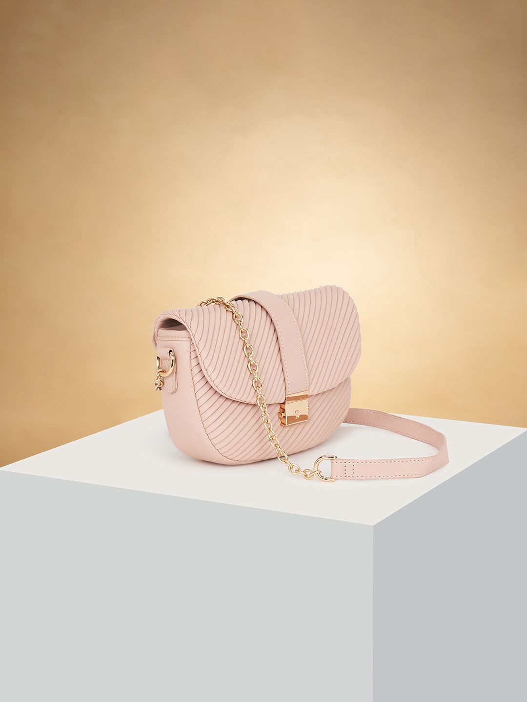 

Forever Glam by Pantaloons PU Structured Sling Bag with Cut Work, Pink