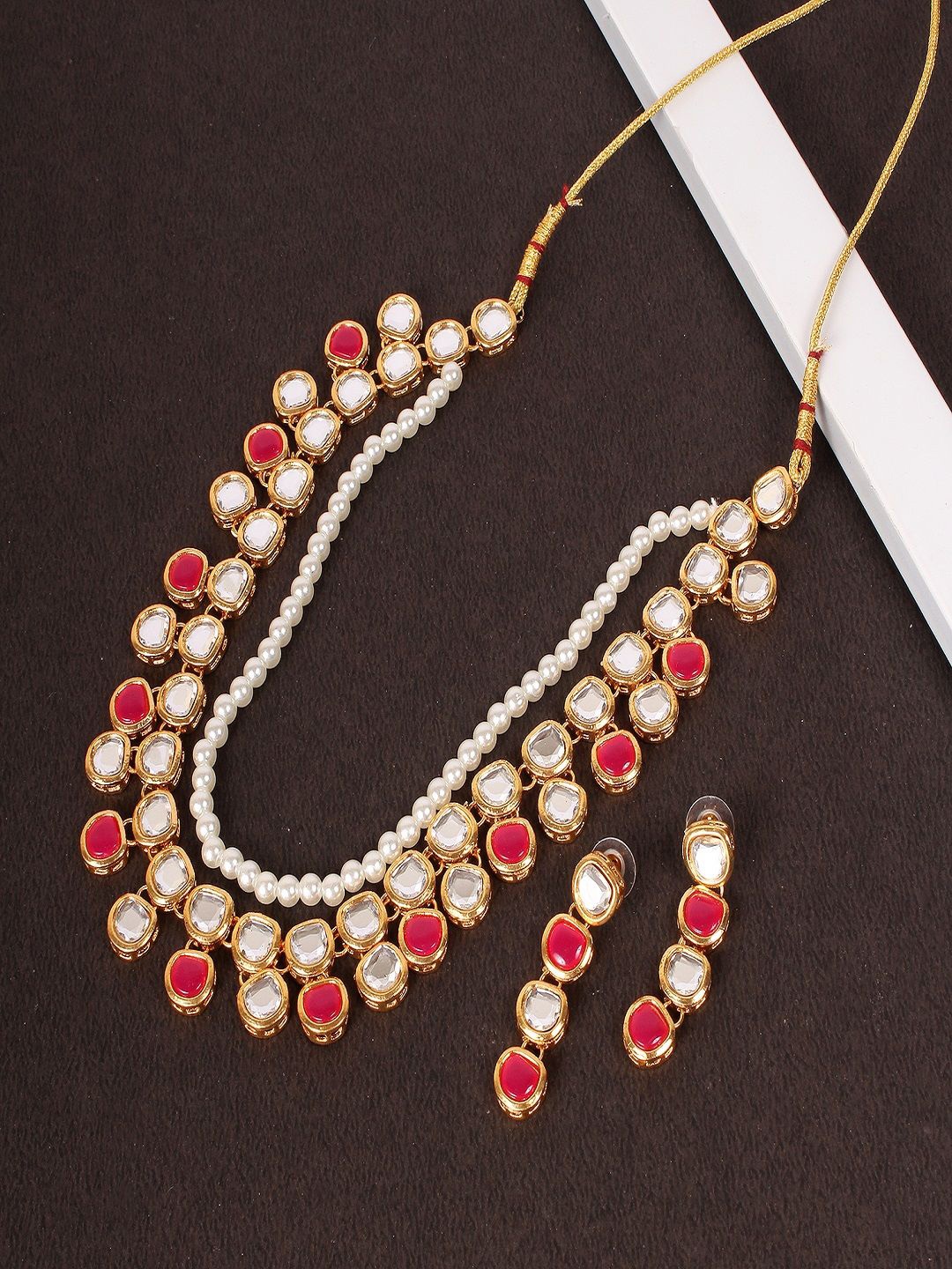 

Divisha Gold Plated Stones-Studded & Beaded Jewellery Set