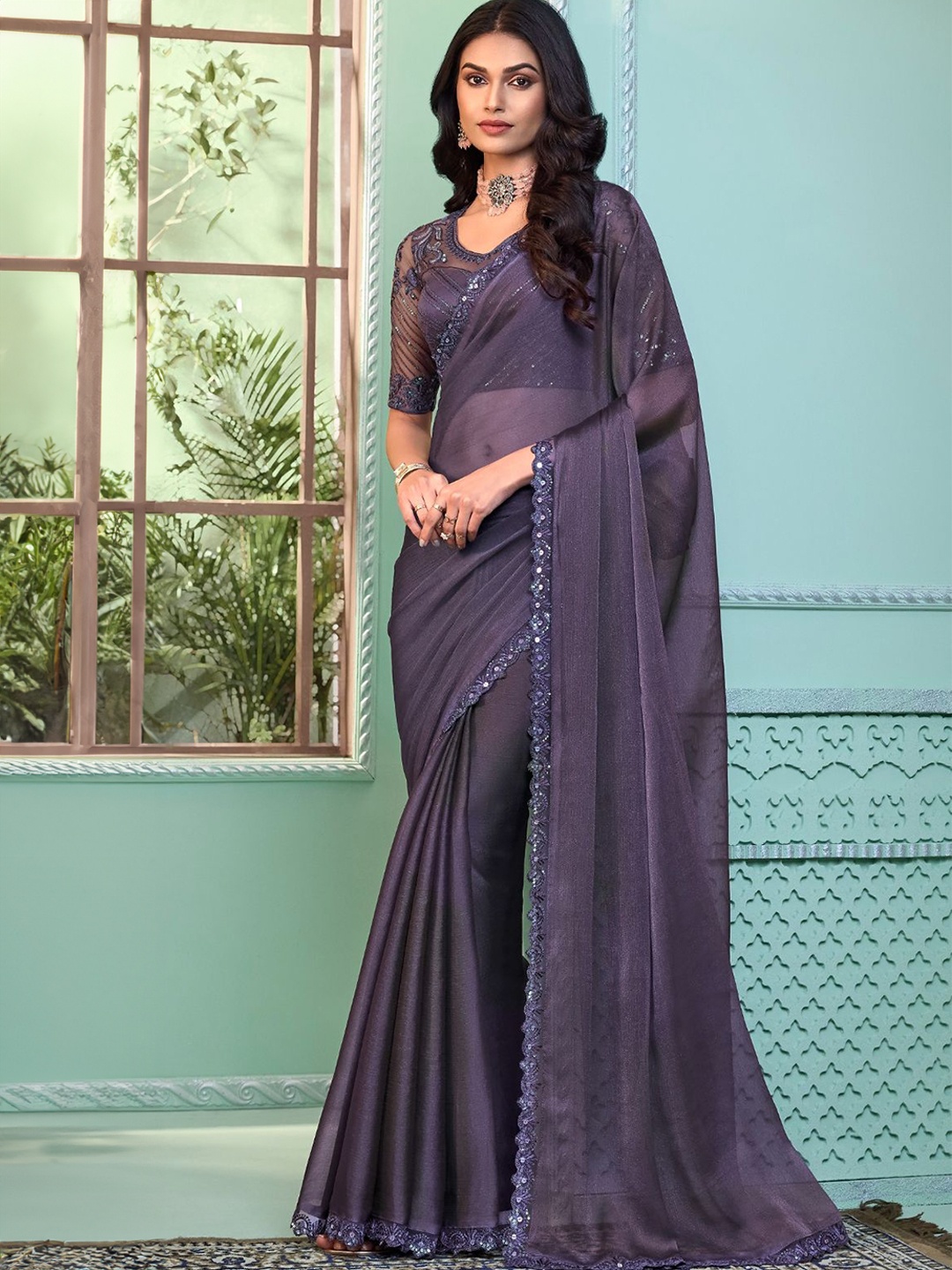 

Reboot Fashions Sequinned Pure Georgette Saree, Mauve