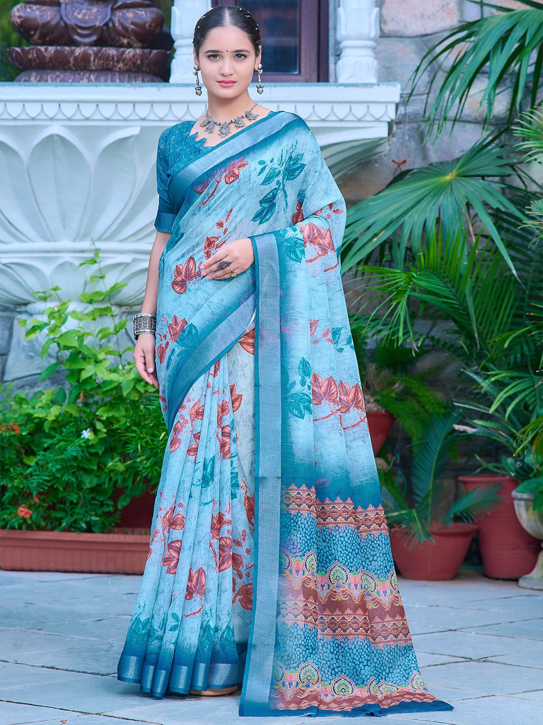 

Anouk Floral Printed Zari Saree, Teal