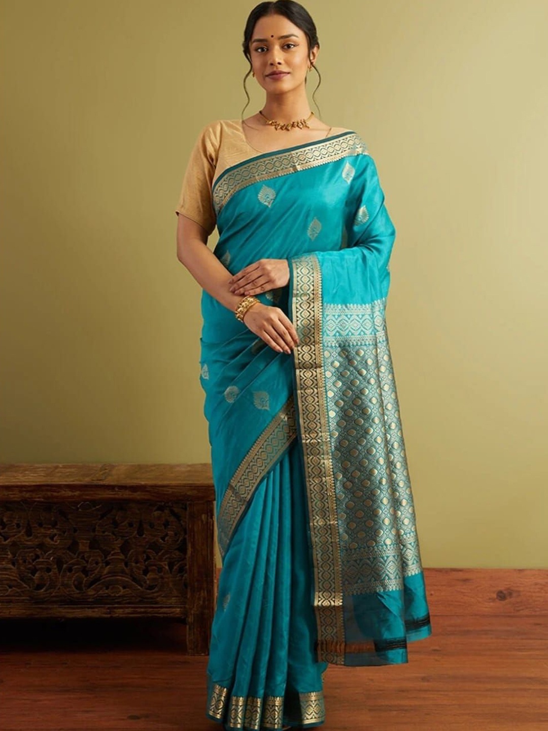 

KALINI Ethnic Motifs Woven Design Zari Banarasi Saree, Teal