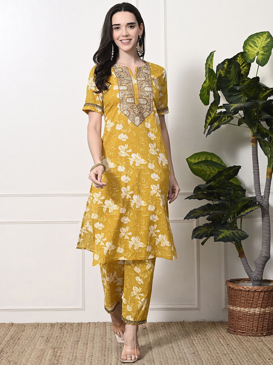 

Myshka Women Ethnic Motifs Embroidered Regular Sequinned Pure Cotton Kurta with Trousers, Yellow