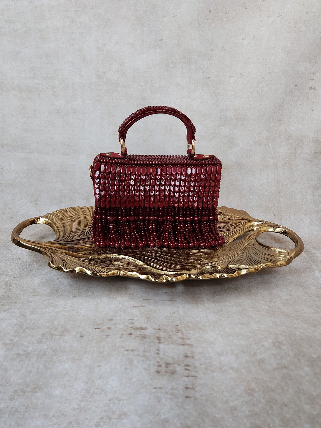 

Adwita Women Embellished Tasselled Handheld Bag, Maroon