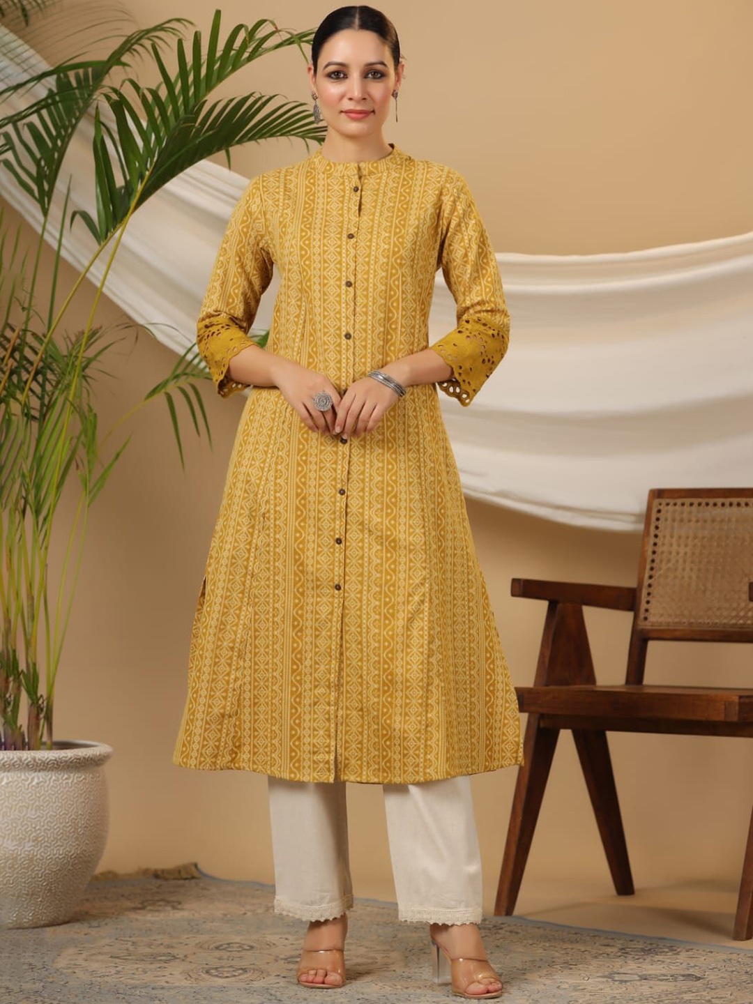 

KALINI Women Ethnic Motifs Printed Panelled Pure Cotton Kurta with Trousers, Yellow