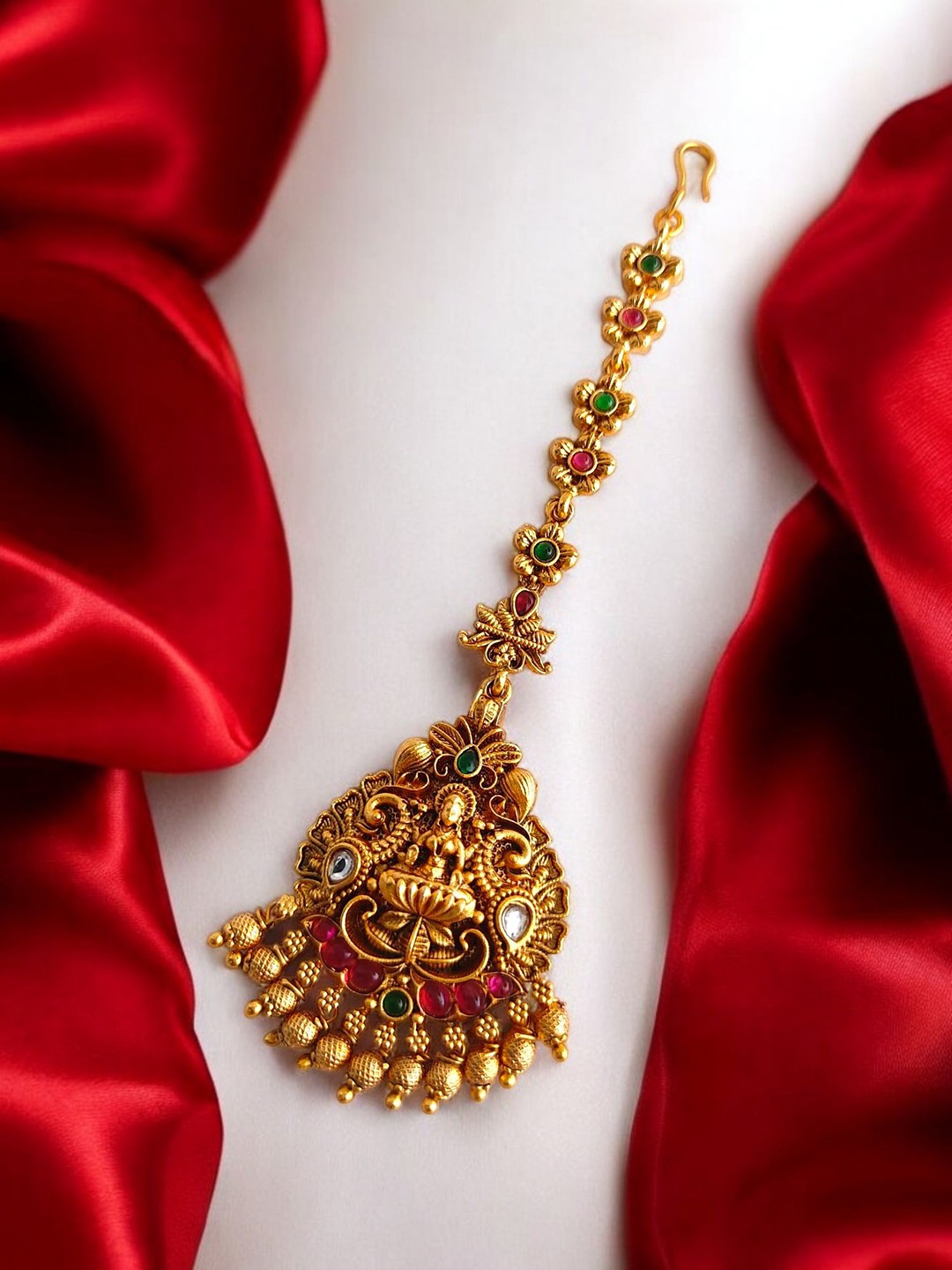 

Pihtara Jewels Gold-Plated Stones Studded Lakshmi Goddess Maang Tikka