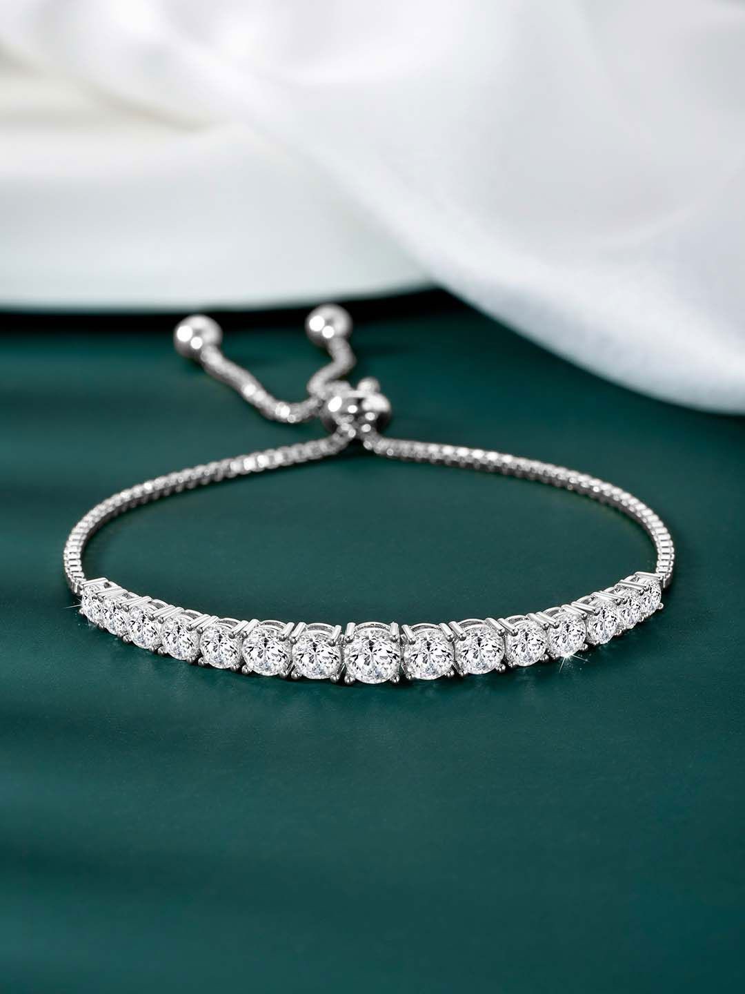 

Peora Women Brass Cubic Zirconia Silver-Plated Charm Bracelet