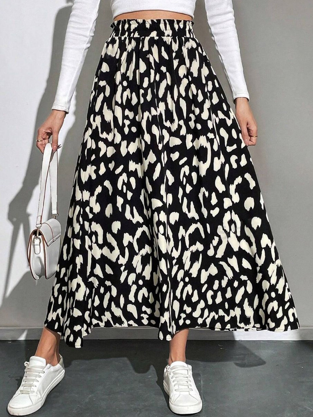 

Taswak Women Abstract Printed Flared Maxi Skirt, Black