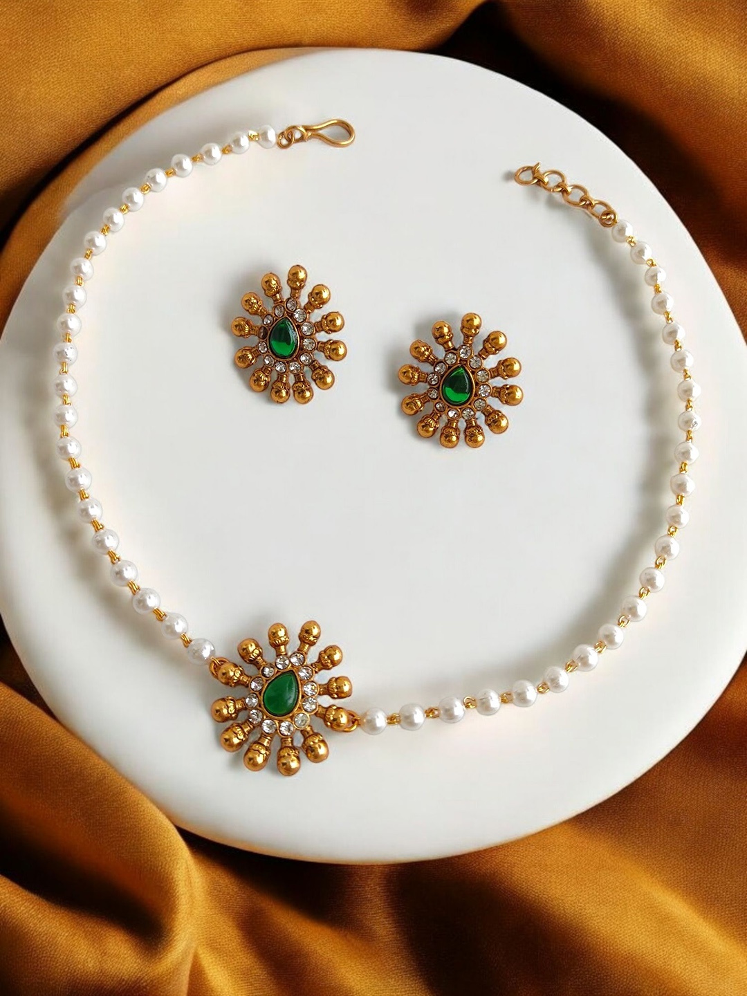 

Pihtara Jewels Gold-Plated Stone Studded & Beaded Jewellery Set