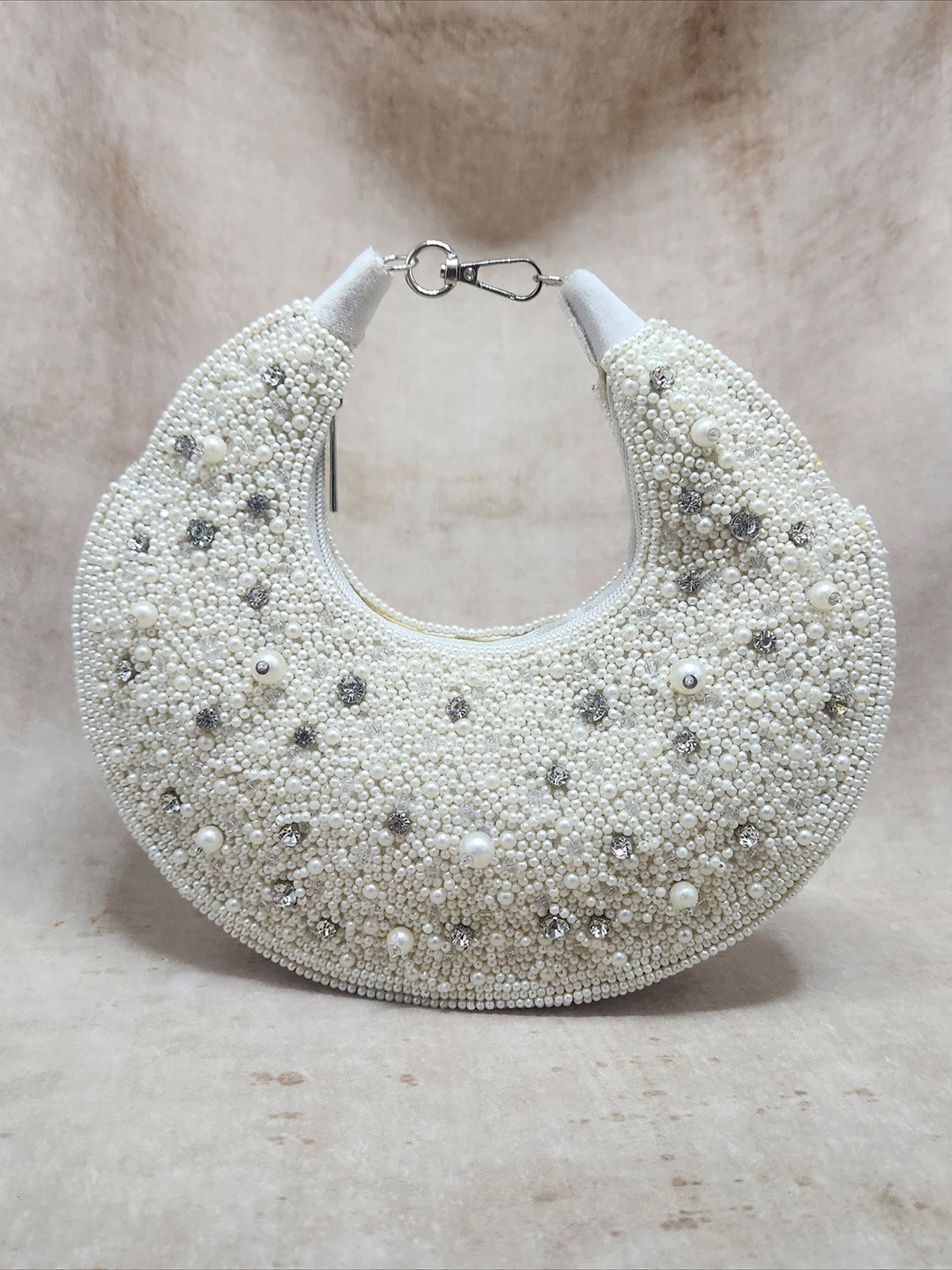 

Adwita Women Embellished Half Moon Handheld Bag, White