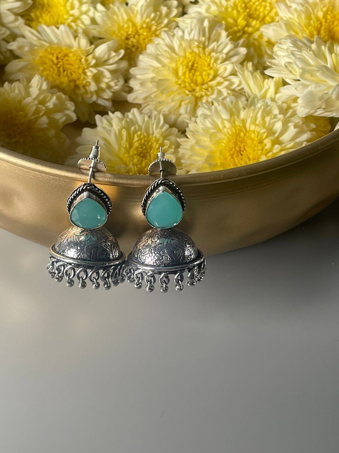 

Niska Artificial Stones Studded Contemporary Jhumkas, Silver