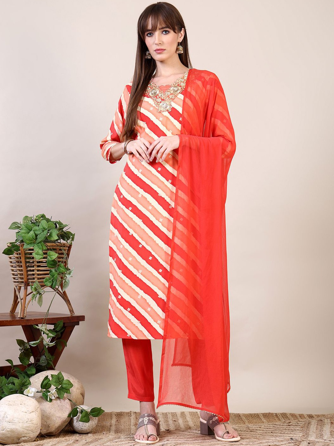 

KALINI Women Leheriya Embroidered Regular Sequinned Chanderi Cotton Kurta with Trousers & With Dupatta, Orange