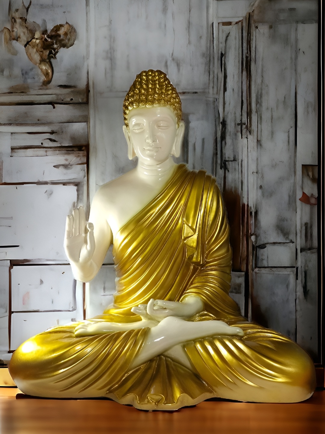 

Vrinban International White & Gold Toned Buddha Idol Showpiece