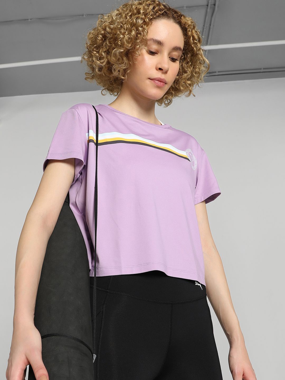 

Puma PUMA x lemlem Relaxed Fit Short Sleeve Training T-Shirt, Violet
