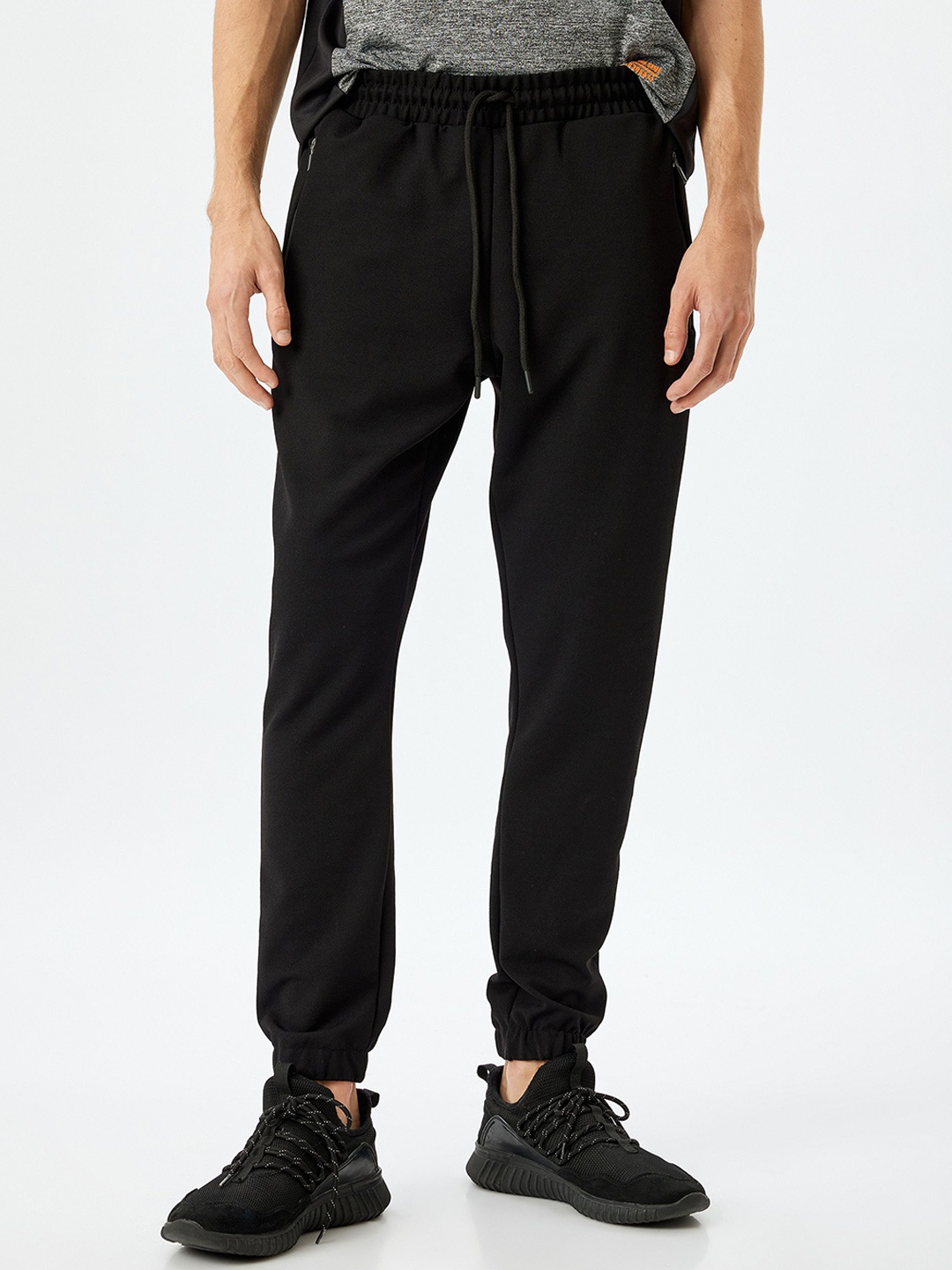 

Koton Men Mid Rise Regular Fit Joggers, Black
