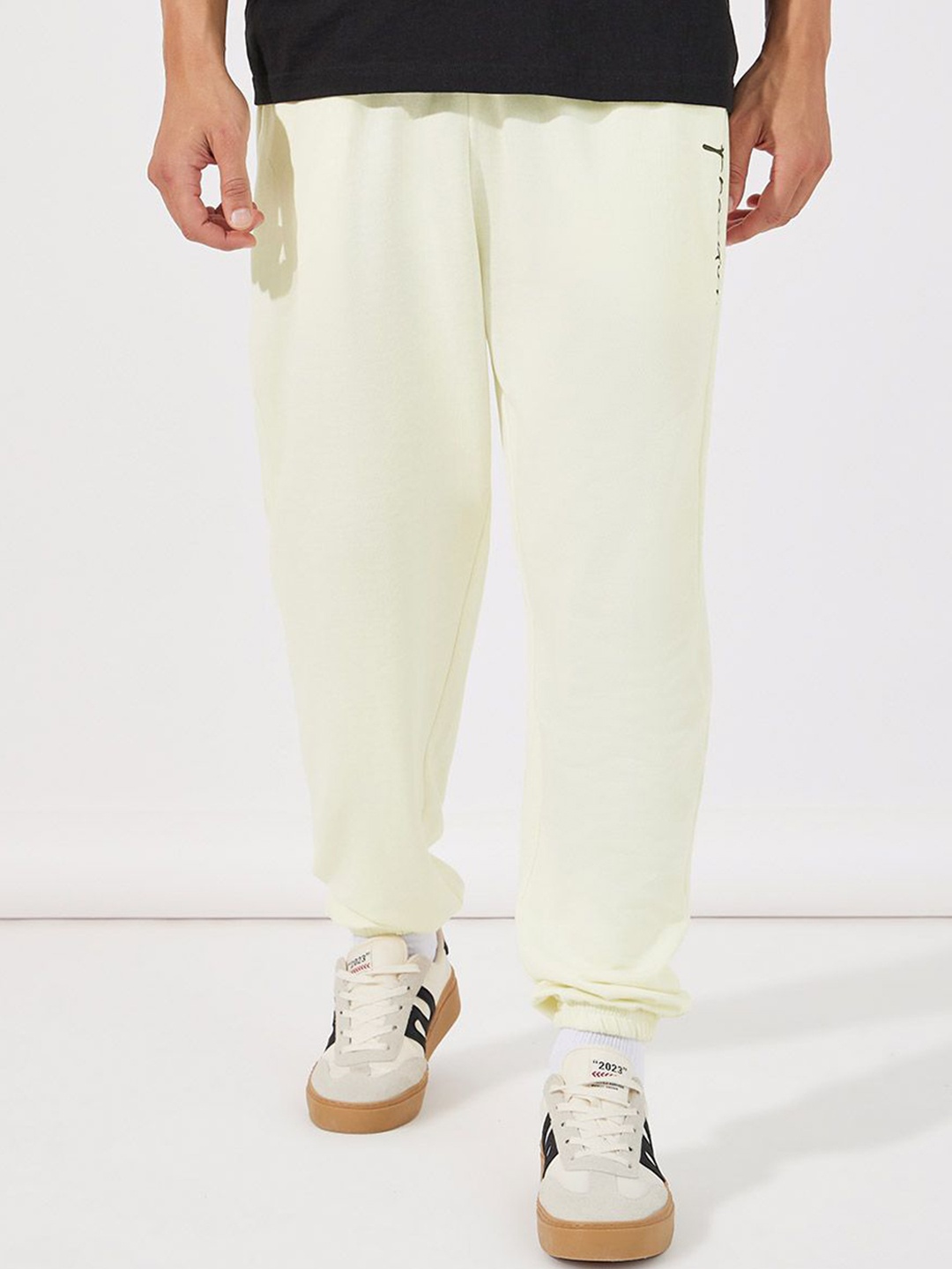 

Styli Men Cream-Coloured Mid-Rise Oversized Fit Joggers