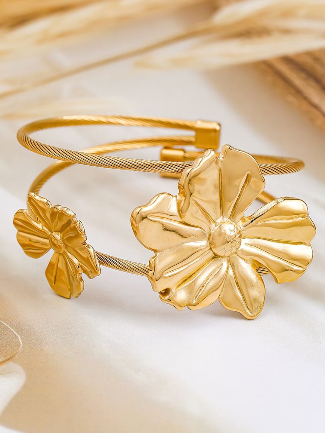 

Rubans 22K Gold-Plated Floral Free Size Cuff Bracelet with Dual Cable Wire Design