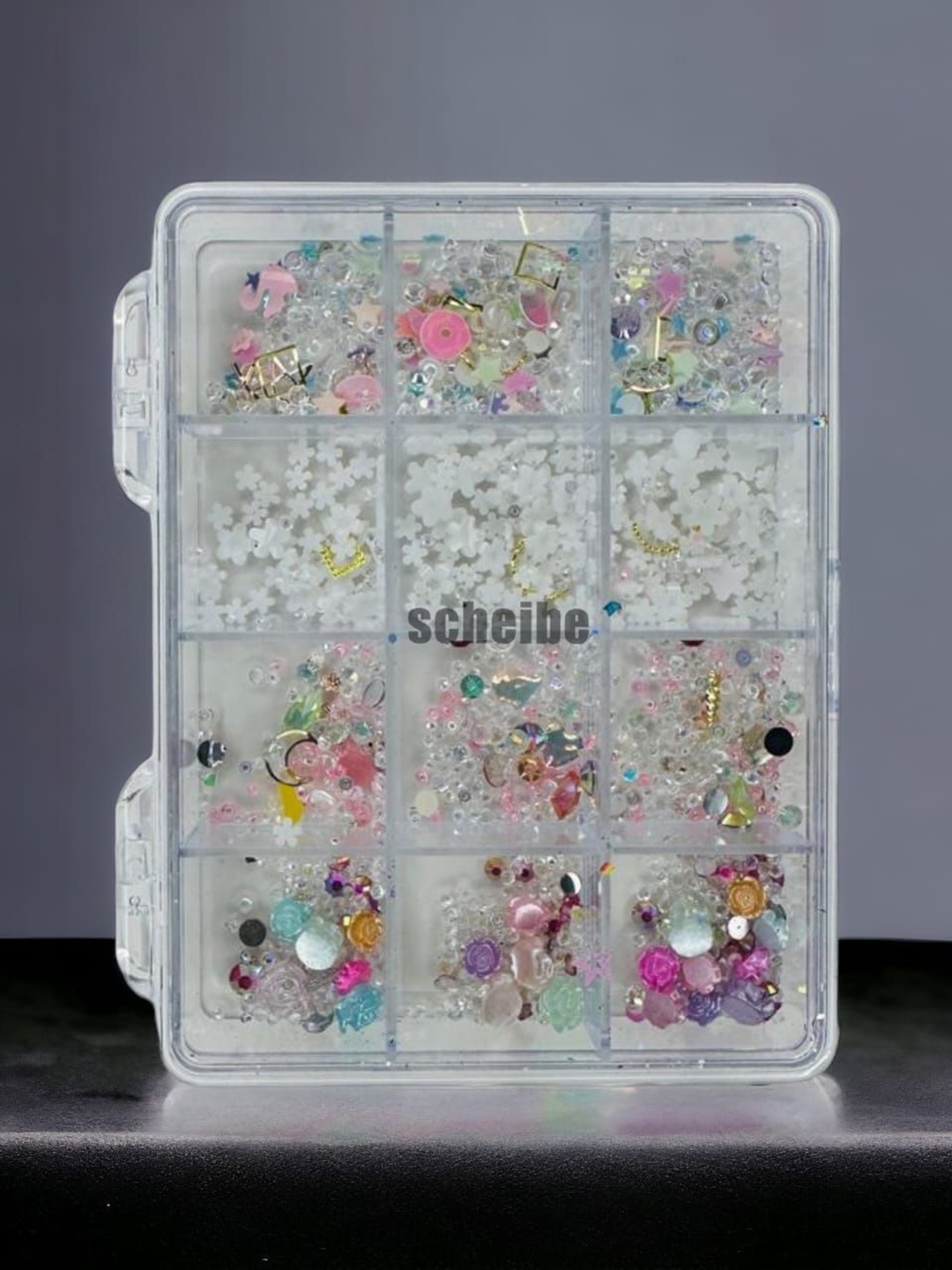 

Scheibe 12 Grid Multi Design Stones & Flowers Nail Art Accessories, White