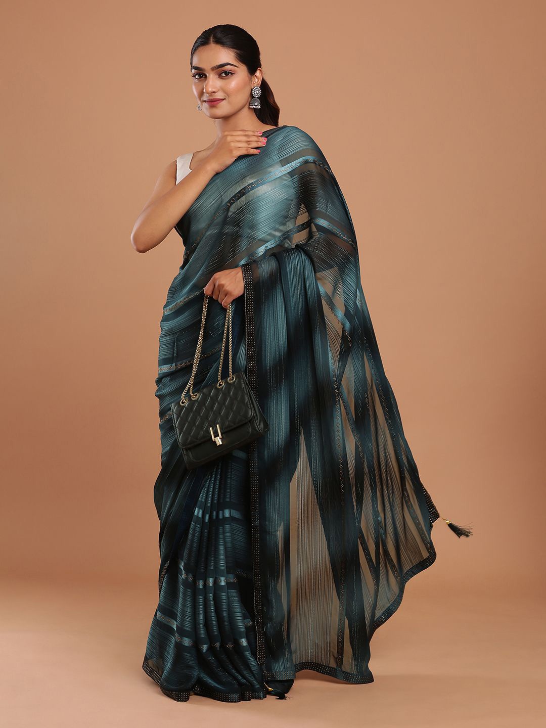 

Kalyan Silks Embellished Beads and Stones Bagru Saree, Teal