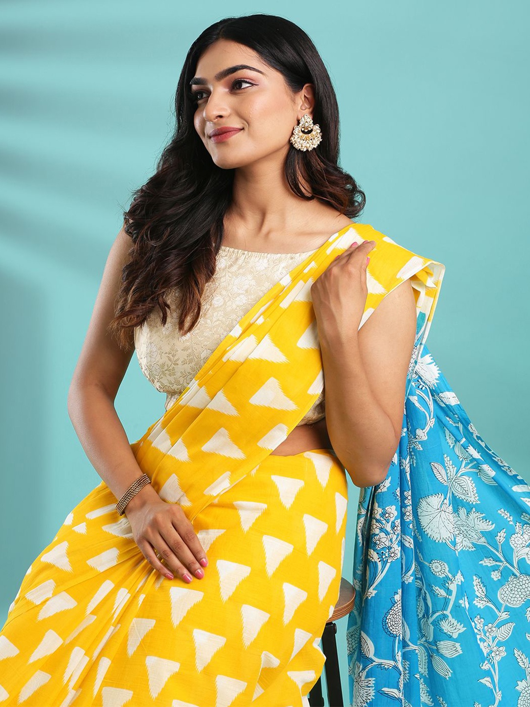 

Kalyan Silks Women Geometric Printed Dabu Saree, Yellow