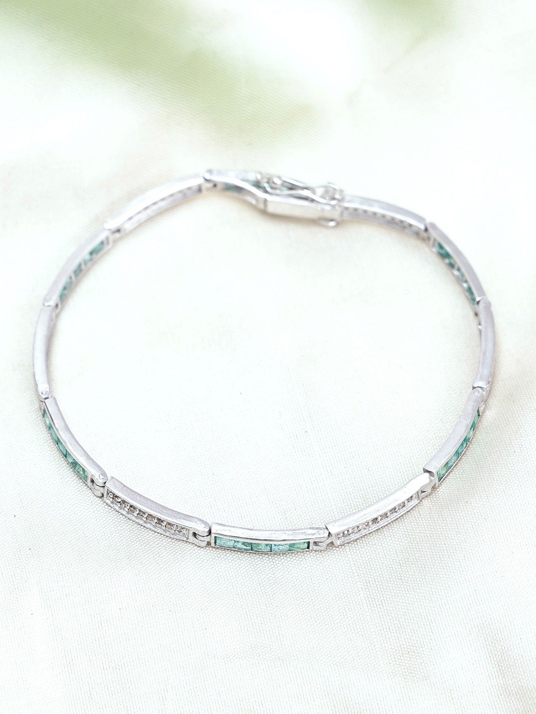 

Exotic India Sterling Silver Bracelet With Green Onyx And Diamond Tennis