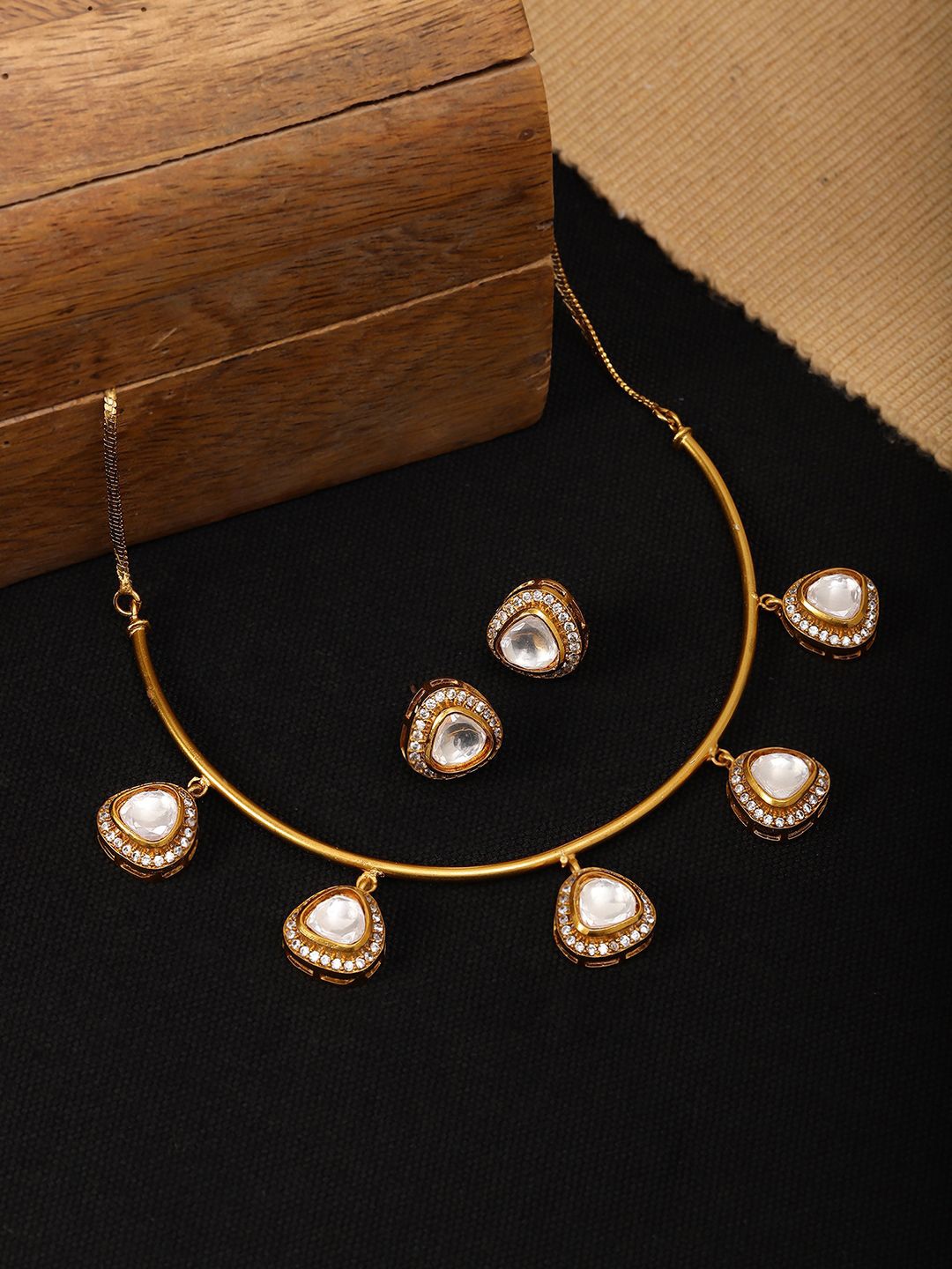 

Ruby Raang Gold-Plated Kundan Stone Studded Jewellery Set