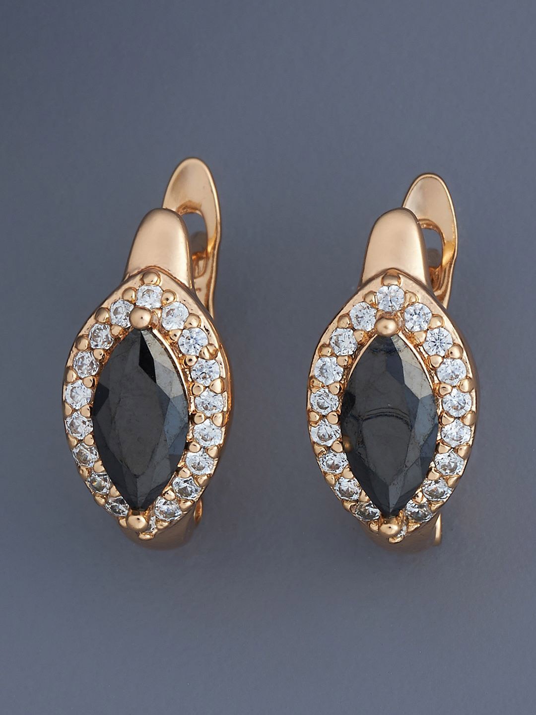 

Kushal's Fashion Jewellery Gold Plated Zircon Studded Leaf Shaped Hoop Earrings