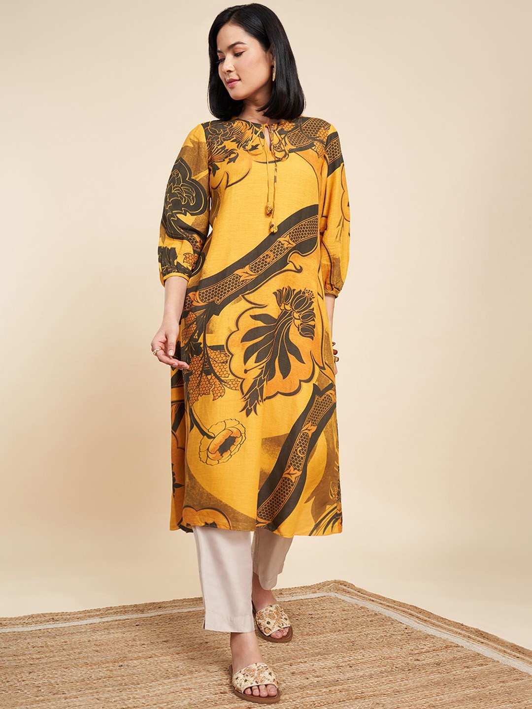 

Marigold Lane Floral Printed Tie-Up Neck A-Line Kurta, Yellow