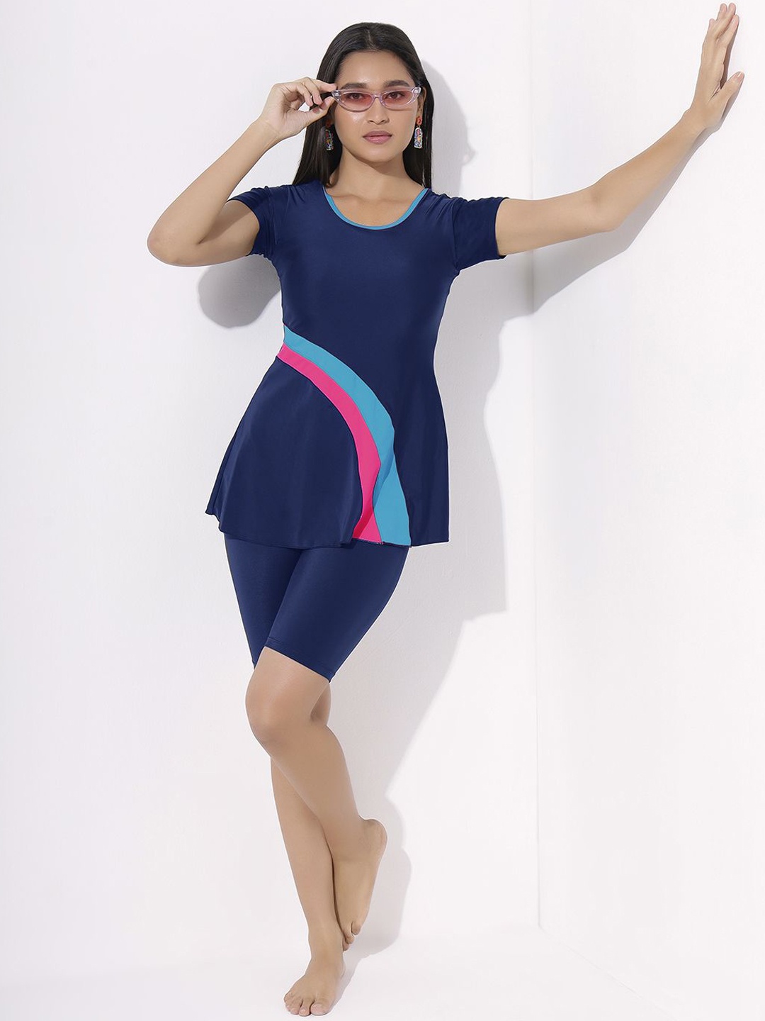 

LYCOT Women Colorblocked Rainbow Rhapsody Swim Dress With Attached Shorts, Navy blue