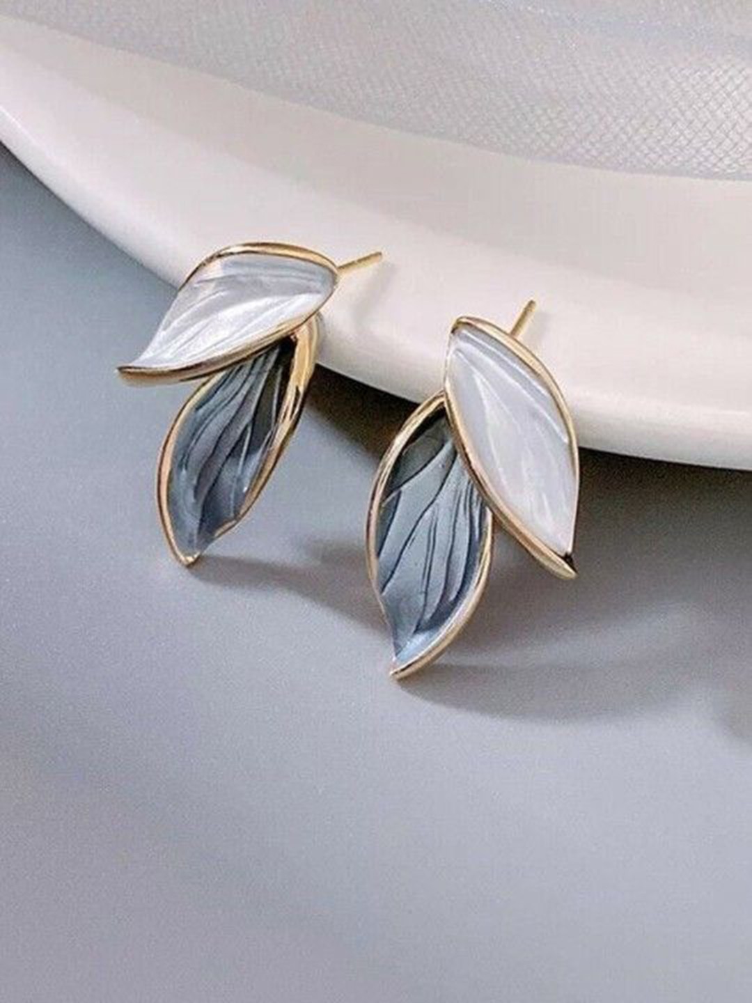 

DressBerry Gold Plated Leaf Shaped Stainless Steel Studs, Black