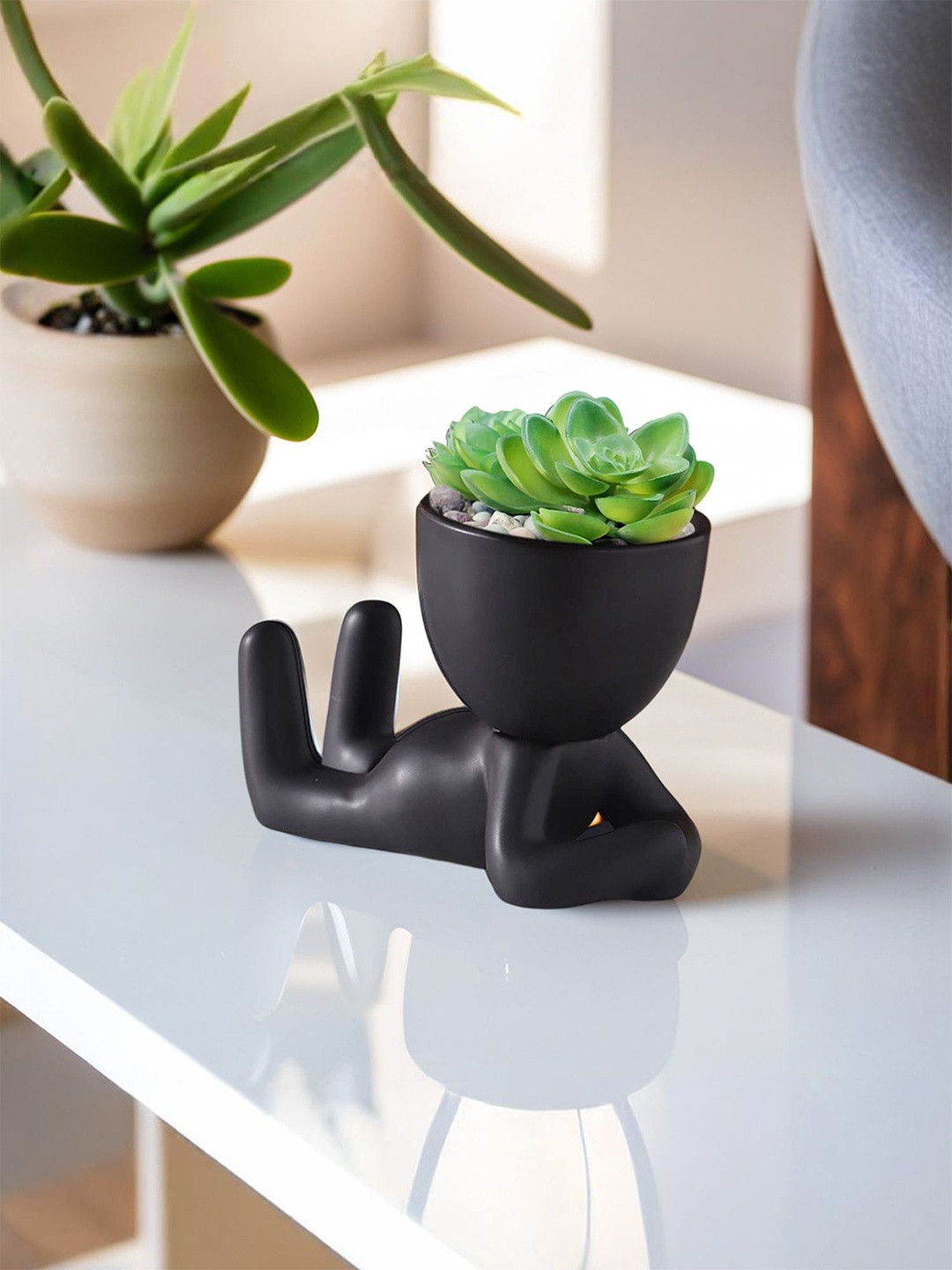 

Ekhasa Black Ceramic Pot For Plant
