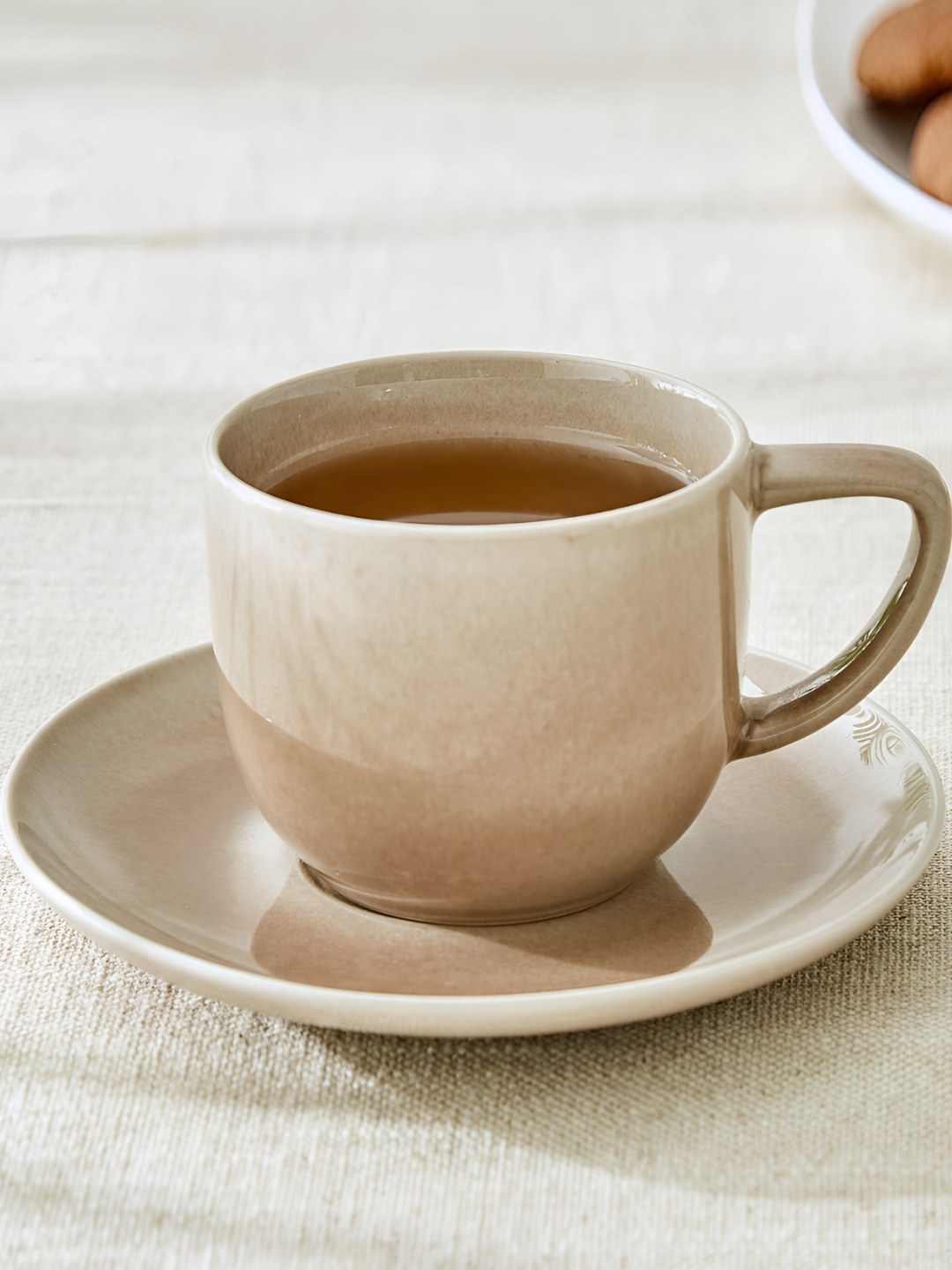 

Home Centre Cadenza Brown Printed Stoneware Matte Cup and Saucer - 160ml