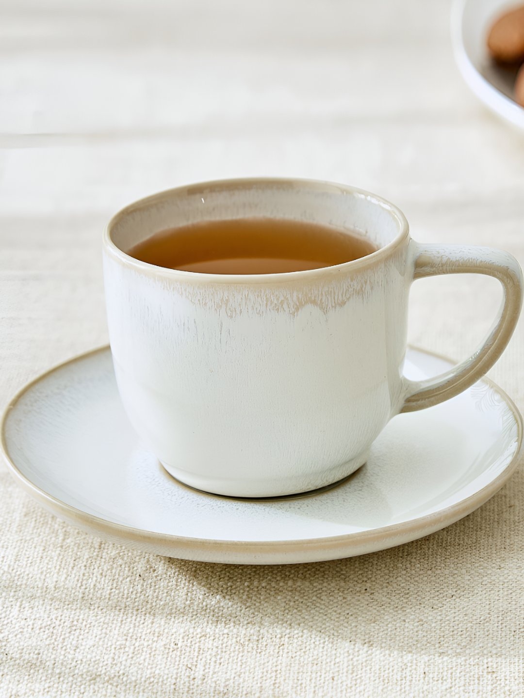 

Home Centre Cadenza Off White Printed Stoneware Glossy Cup and Saucer - 160ml