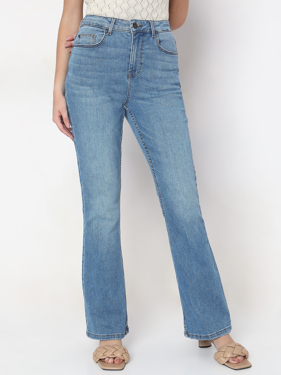 

Vero Moda Women Flared High-Rise Light Fade Stretchable Jeans, Blue
