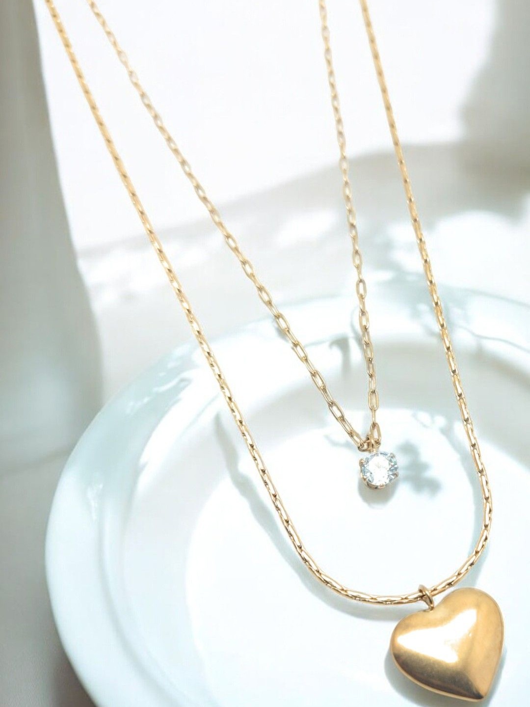 

Adc fashions Rose Gold-Plated Stones Studded Heart Shaped Layered Necklace