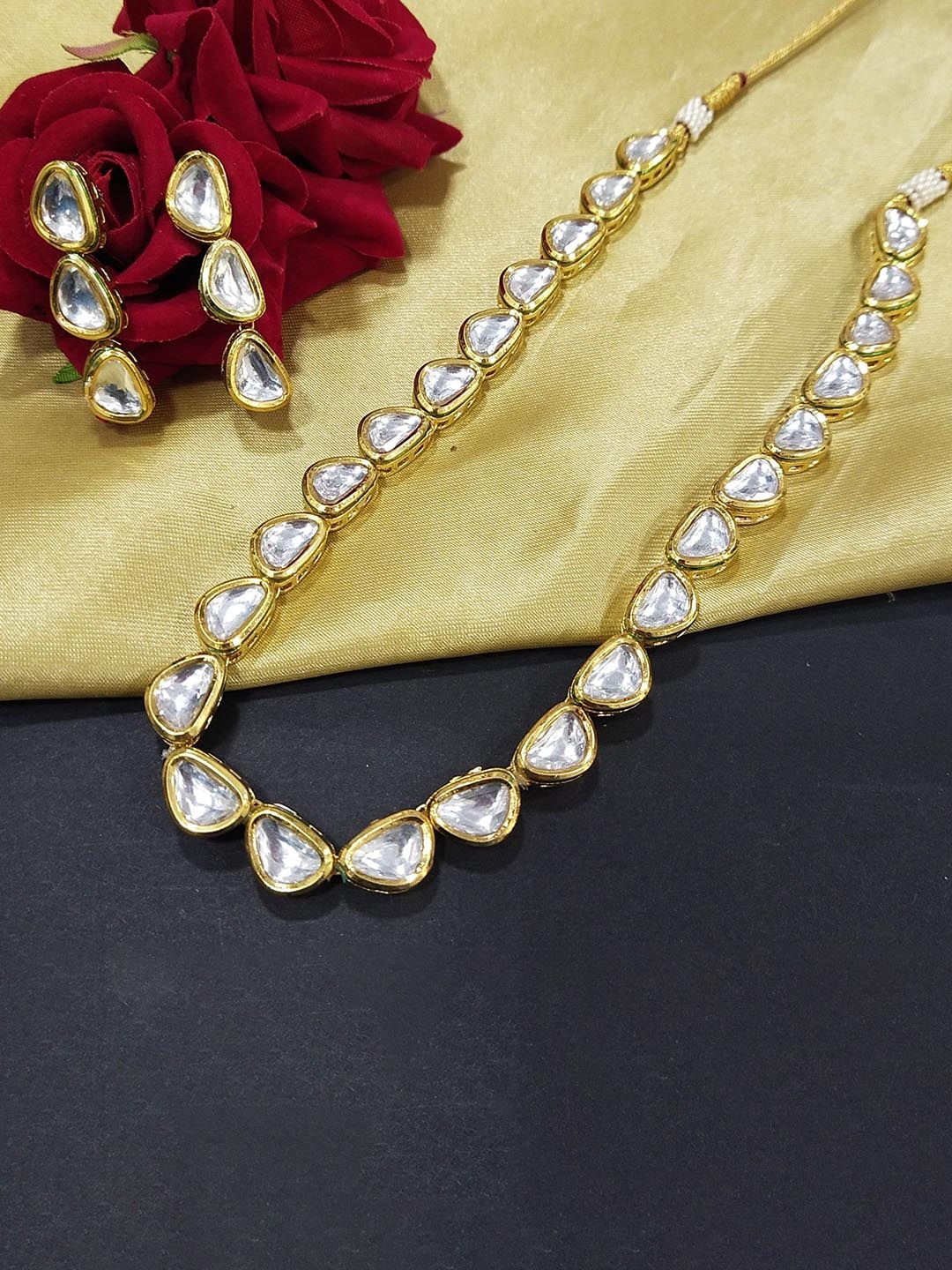 

Knigght Angel Jewels Gold Plated Kundan Stone Studded Jewellery Set