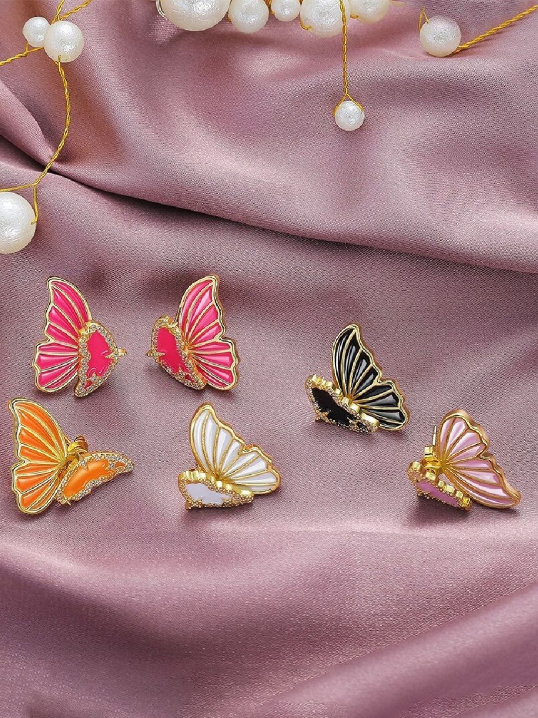 

ZIVOM Gold-Plated CZ -Stone Studded Double Sided Butterfly Shaped Ear Cuff Earrings