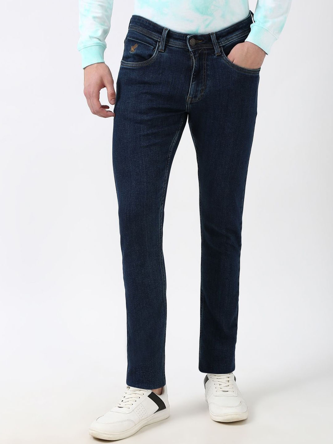 

Peter England Casuals Men Clean Look Crinkle Tapered Fit Mid-Rise Jeans, Navy blue