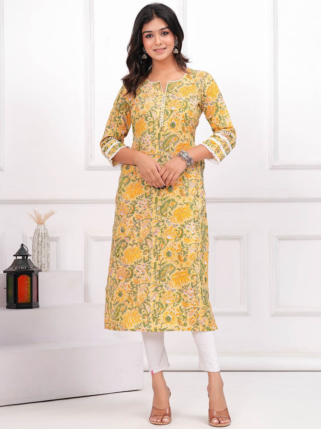 

Meeranshi Floral Printed Straight Kurta, Yellow