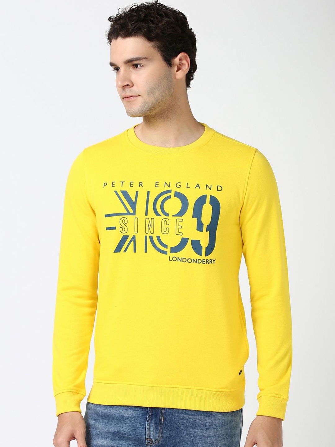 

Peter England Casuals Men Printed Long Sleeves Sweatshirt, Yellow