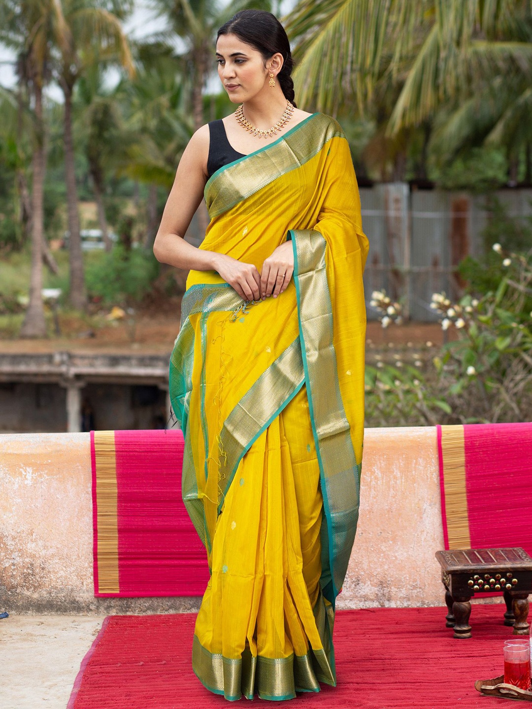 

Unnati Silks Ethnic Motifs Woven Design Zari Maheshwari Saree, Yellow